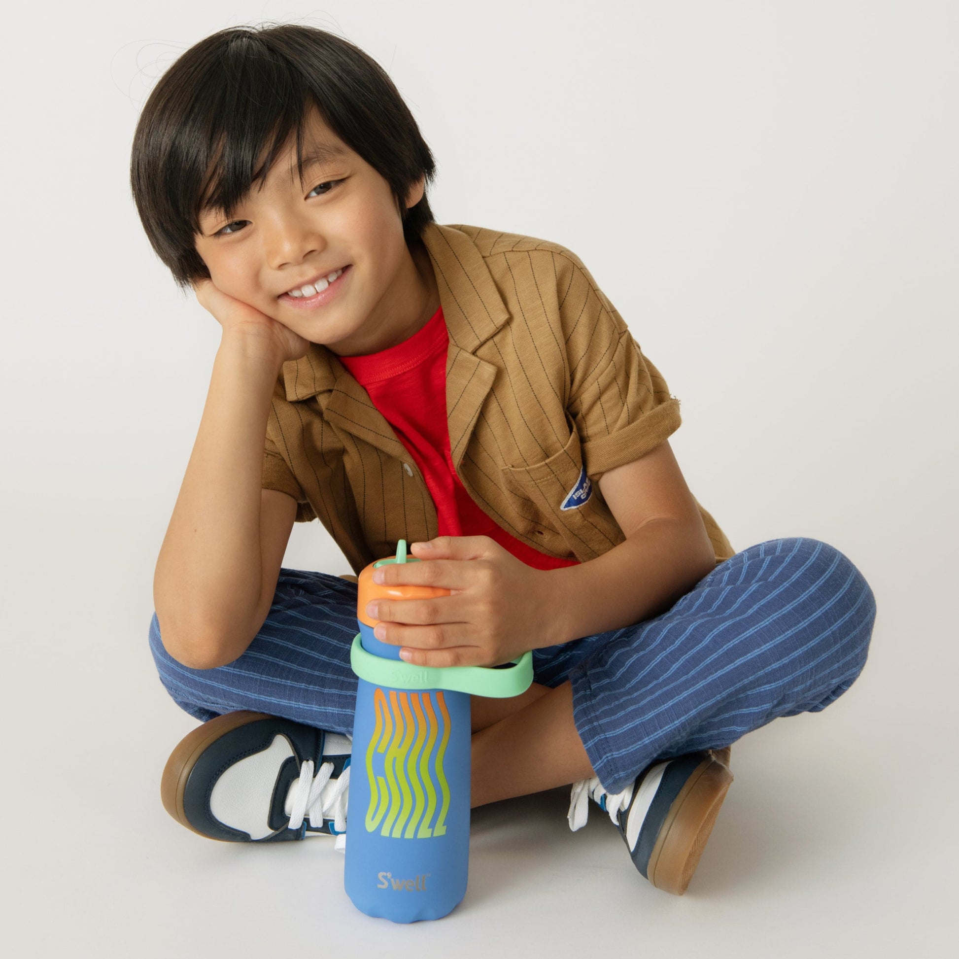 traveler-with-flip-straw-lid-16oz-g9 Swell-Kids-Water-Bottle-Traveler-16oz-Blue-Chill-Lifestyle.jpg
